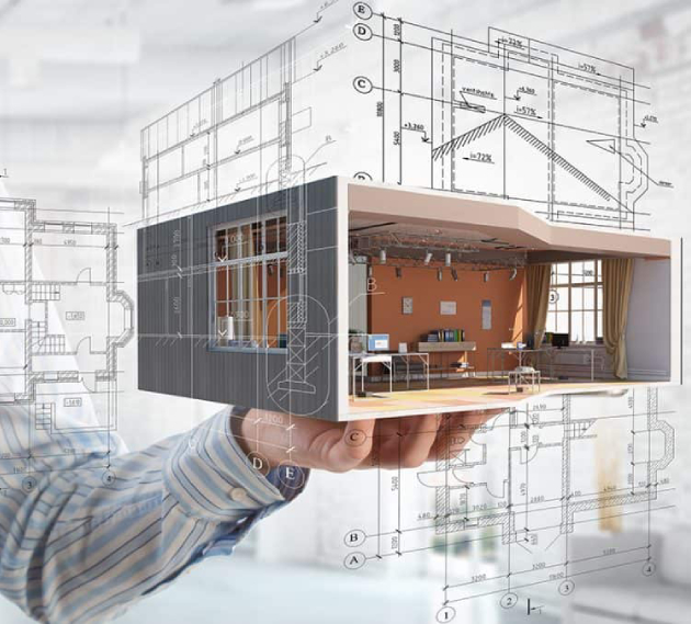 A person reviewing architectural drawings